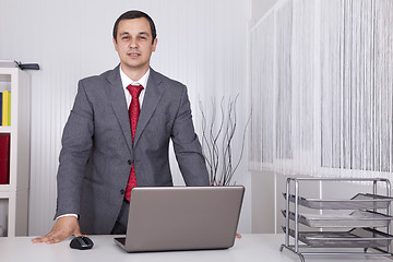 Image showing Powerful businessman at the office