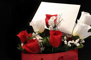 Image showing valentines artificial flowers with card