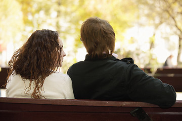 Image showing Young couple in park rear view