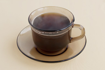 Image showing A cup of brown glass