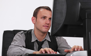 Image showing Young man working on a computer