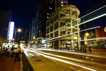 Image showing Fast moving cars at night 