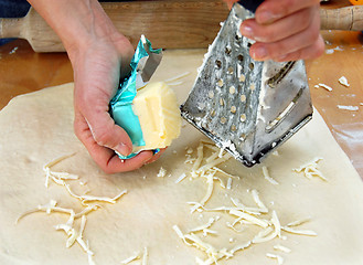 Image showing Grated butter on dough