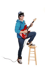 Image showing Teen boy with guitar.