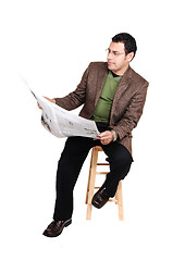 Image showing Man reading newspaper.