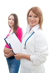 Image showing Pregnant woman and a doctor