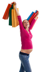 Image showing Happy pregnant woman with shopping bags