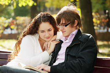 Image showing Couple reading book