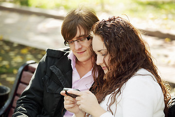 Image showing Young couple with communicator