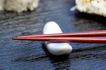 Image showing chopsticks sushi