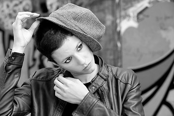 Image showing  Woman playing with her hat