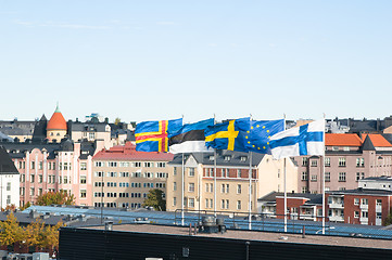 Image showing Fluttering Scandinavian flags against the sky