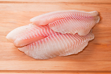 Image showing Fillet of fish on a kitchen board 