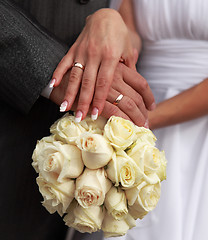 Image showing Holding a wedding bouquet