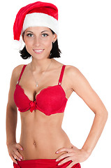 Image showing Portrait of beautiful woman in red santa hat