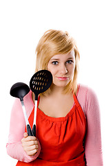 Image showing young housewife with kitchen utensil