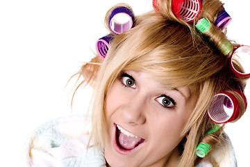 Image showing funny housewife with curlers