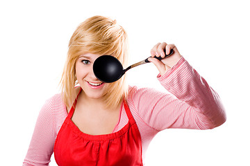 Image showing young housewife with soup ladle