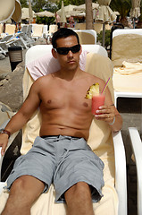Image showing Man holding drink