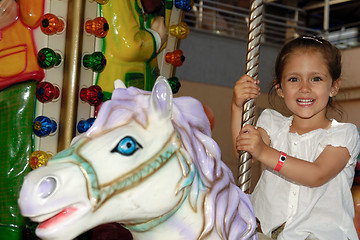 Image showing Child in carousel