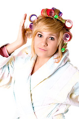 Image showing funny housewife with curlers