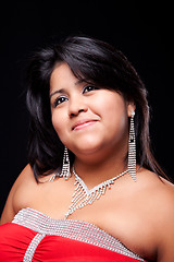Image showing happy large latin woman, well dressed