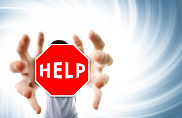 Image showing Man grabing a help sign.