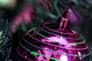 Image showing Christmas ornaments on tree.