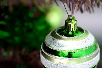 Image showing Christmas ornaments on tree.