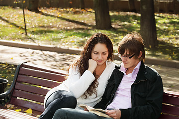 Image showing Couple with book