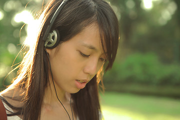 Image showing girl enjoy music with headphones