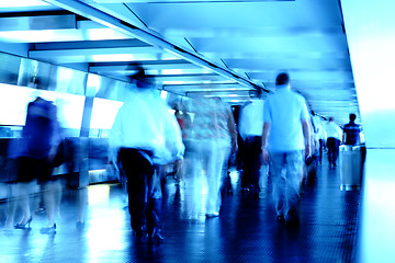 Image showing busy people in blured motion