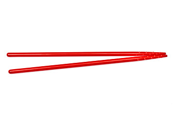 Image showing Red chopsticks isolated on white 