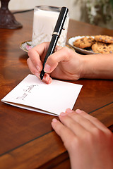 Image showing Boy or girl writing a letter to Santa