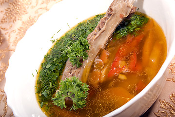 Image showing appetizing hot soup in a soup-plate