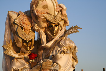 Image showing A masked couple in love