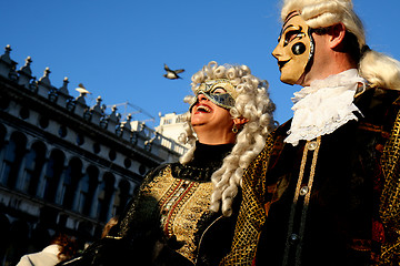 Image showing A couple with masks on the Piazza San Marco