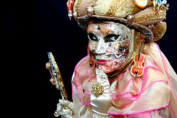 Image showing Lady with a mask covered with musical notes