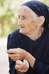 Image showing Portrait of elderly woman looking sideways