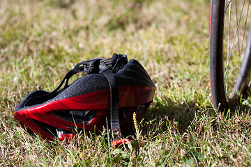 Image showing red helmet upside-down