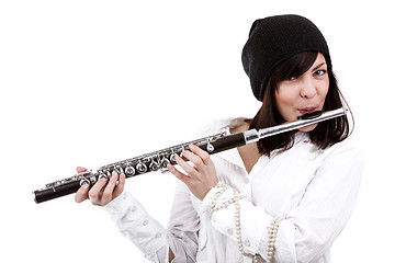 Image showing Girl playing on flute