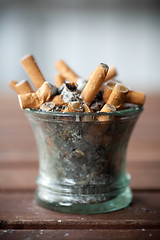 Image showing ashtray full with butts