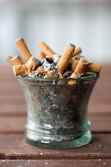 Image showing ashtray full with butts