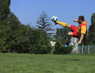 Image showing Acrobatic soccer player