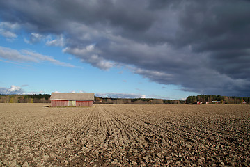 Image showing Barn, Sky and the Ploughed Field Landscape