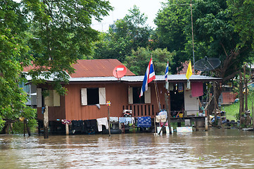 Image showing House on stilts during a flood in Thailand