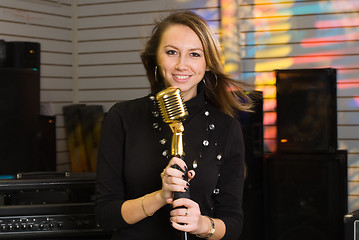 Image showing Woman with microphone