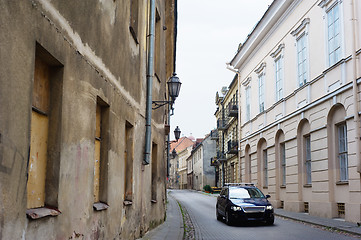 Image showing Modern car in narrow paved street