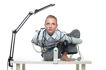 Image showing Constrained woman in office