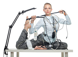 Image showing Flexible business woman dealing with disorder